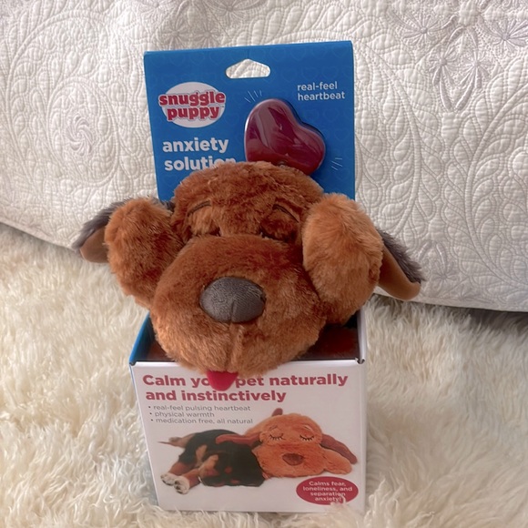 Snuggle Puppy helps keep your new pup calm and secure.